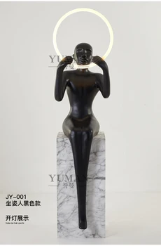 Sėdinti figūra Skulptūra Grindys Lempa Gyvojo meno parodų salė Dekoravimas Žmogaus formos ornamentai